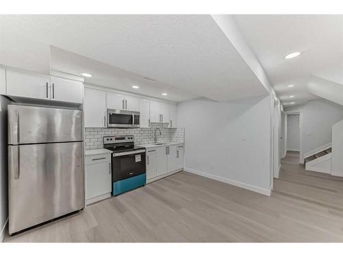 6129 Maddock Drive Ne, Calgary, AB - Indoor Photo Showing Kitchen With Stainless Steel Kitchen