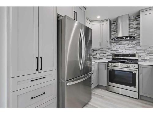 1272 Hunterburn Crescent Nw, Calgary, AB - Indoor Photo Showing Kitchen With Stainless Steel Kitchen