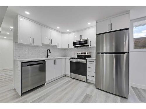 1272 Hunterburn Crescent Nw, Calgary, AB - Indoor Photo Showing Kitchen With Stainless Steel Kitchen With Upgraded Kitchen