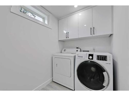 1272 Hunterburn Crescent Nw, Calgary, AB - Indoor Photo Showing Laundry Room