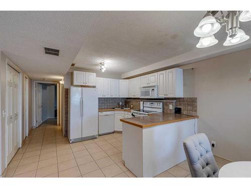 46 Country Hills Heights Nw, Calgary, AB - Indoor Photo Showing Kitchen With Double Sink