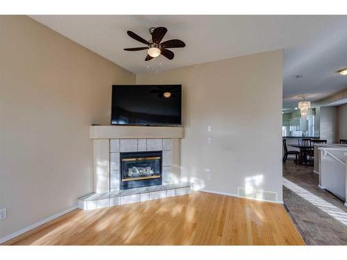 46 Country Hills Heights Nw, Calgary, AB - Indoor Photo Showing Living Room With Fireplace