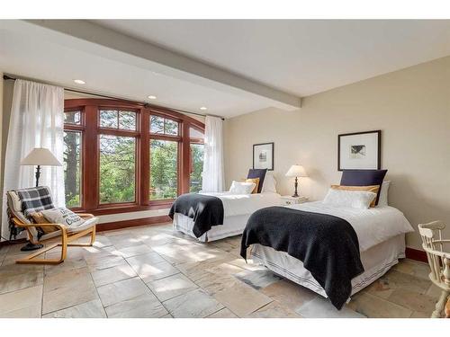 32 Wolfwillow Ridge, Rural Rocky View County, AB - Indoor Photo Showing Bedroom