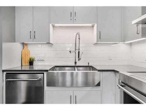 8-5400 Dalhousie Drive Nw, Calgary, AB - Indoor Photo Showing Kitchen With Stainless Steel Kitchen With Double Sink With Upgraded Kitchen