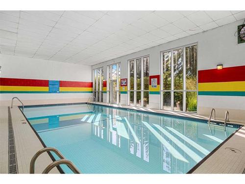 8-5400 Dalhousie Drive Nw, Calgary, AB - Indoor Photo Showing Other Room With In Ground Pool