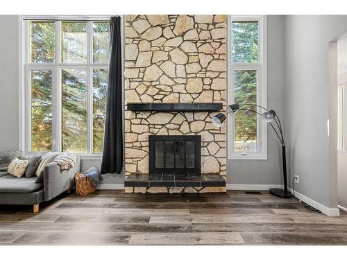 8-5400 Dalhousie Drive Nw, Calgary, AB - Indoor Photo Showing Living Room With Fireplace