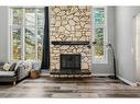 8-5400 Dalhousie Drive Nw, Calgary, AB  - Indoor Photo Showing Living Room With Fireplace 