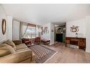 98-2720 Rundleson Road Ne, Calgary, AB  - Indoor Photo Showing Living Room 