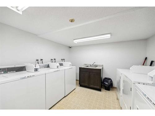 307-1915 26 Street Sw, Calgary, AB - Indoor Photo Showing Laundry Room