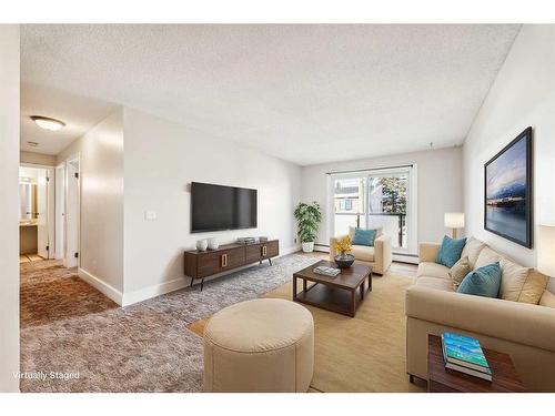 307-1915 26 Street Sw, Calgary, AB - Indoor Photo Showing Living Room