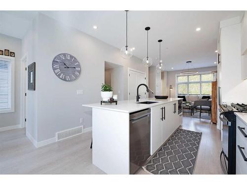 3008 85 Street Sw, Calgary, AB - Indoor Photo Showing Kitchen With Upgraded Kitchen