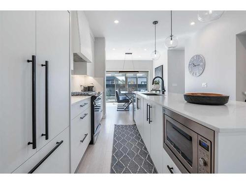 3008 85 Street Sw, Calgary, AB - Indoor Photo Showing Kitchen With Upgraded Kitchen