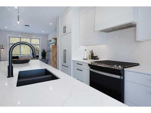 3008 85 Street Sw, Calgary, AB - Indoor Photo Showing Kitchen With Double Sink With Upgraded Kitchen