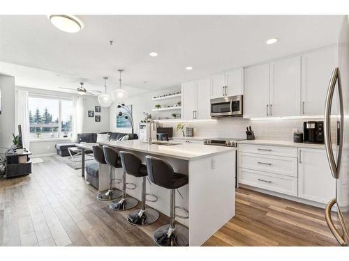 113-8530 8A Avenue Sw, Calgary, AB - Indoor Photo Showing Kitchen With Stainless Steel Kitchen With Upgraded Kitchen