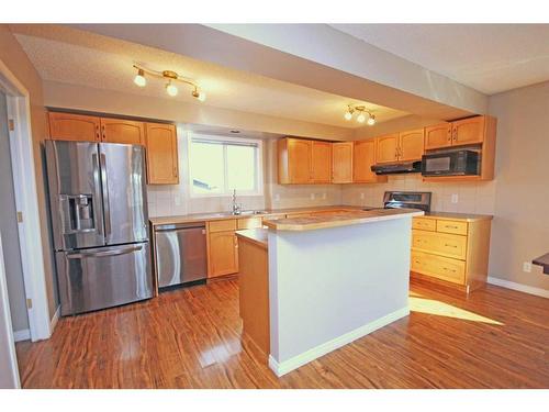 2 Bridlecrest Gardens Sw, Calgary, AB - Indoor Photo Showing Kitchen With Stainless Steel Kitchen