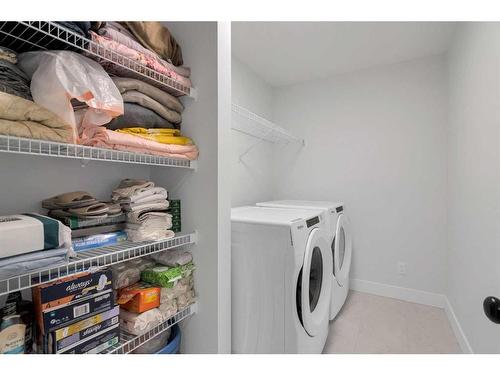 275 Lucas Way, Calgary, AB - Indoor Photo Showing Laundry Room