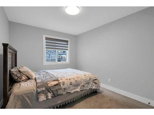 275 Lucas Way, Calgary, AB - Indoor Photo Showing Bedroom