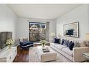 302-835 19 Avenue Sw, Calgary, AB  - Indoor Photo Showing Living Room 