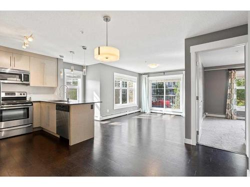 1211-11 Mahogany Row Se, Calgary, AB - Indoor Photo Showing Kitchen With Stainless Steel Kitchen