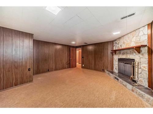 1107 Hunterston Hill Nw, Calgary, AB - Indoor With Fireplace