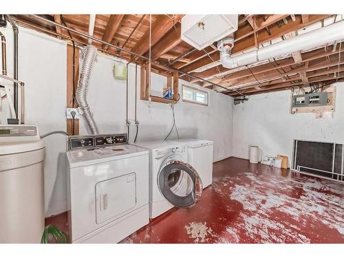 1107 Hunterston Hill Nw, Calgary, AB - Indoor Photo Showing Laundry Room