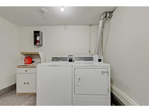 101-1817 11 Avenue Sw, Calgary, AB - Indoor Photo Showing Laundry Room