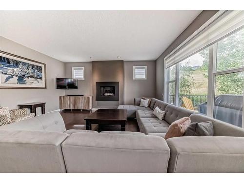 270 Chaparral Valley Terrace Se, Calgary, AB - Indoor Photo Showing Living Room With Fireplace