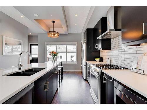 8028 Masters Boulevard Se, Calgary, AB - Indoor Photo Showing Kitchen With Double Sink With Upgraded Kitchen