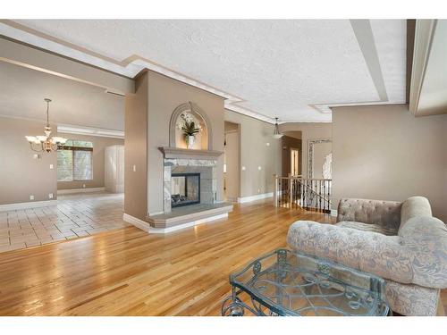 307 Wildwood Drive Sw, Calgary, AB - Indoor Photo Showing Living Room With Fireplace