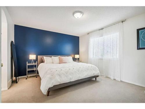 157 Evansmeade Circle Nw, Calgary, AB - Indoor Photo Showing Bedroom