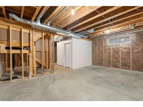 628 Midtown Place Sw, Airdrie, AB - Indoor Photo Showing Basement