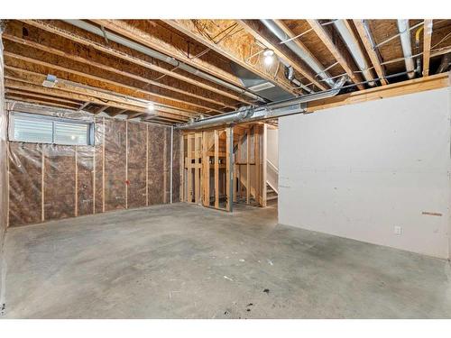 628 Midtown Place Sw, Airdrie, AB - Indoor Photo Showing Basement