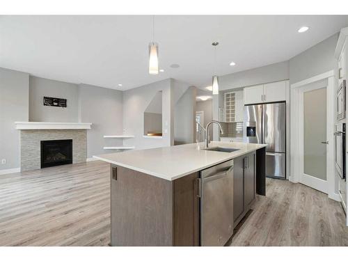 628 Midtown Place Sw, Airdrie, AB - Indoor Photo Showing Kitchen With Upgraded Kitchen