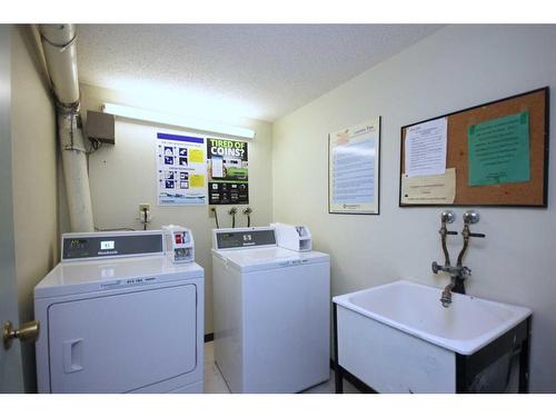 314-315 Heritage Drive Se, Calgary, AB - Indoor Photo Showing Laundry Room