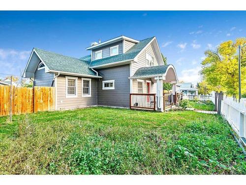 2210 23 Street, Nanton, AB - Outdoor With Deck Patio Veranda