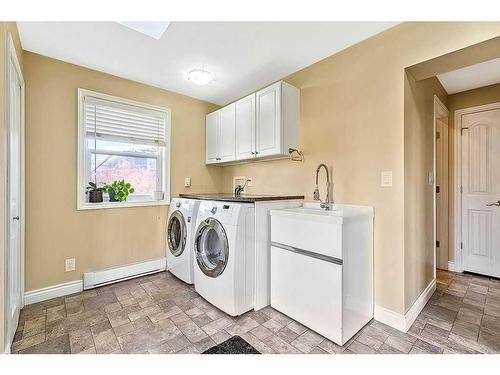 2210 23 Street, Nanton, AB - Indoor Photo Showing Laundry Room