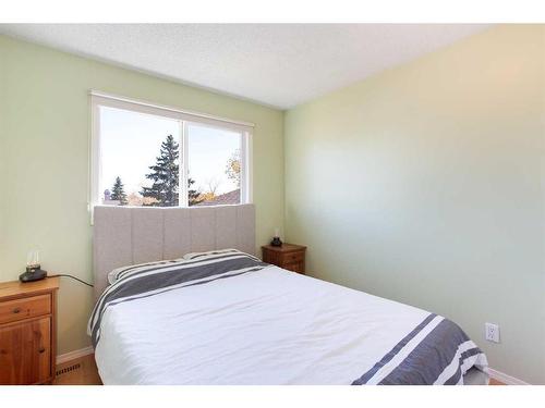 103 Ranch Glen Place Nw, Calgary, AB - Indoor Photo Showing Bedroom