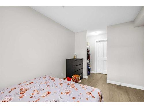 107-7130 80 Ave Ne, Calgary, AB - Indoor Photo Showing Bedroom