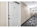 107-7130 80 Ave Ne, Calgary, AB  - Indoor Photo Showing Other Room 