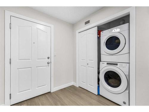 107-7130 80 Ave Ne, Calgary, AB - Indoor Photo Showing Laundry Room