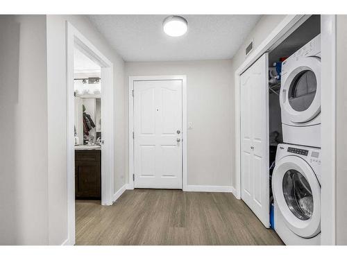 107-7130 80 Ave Ne, Calgary, AB - Indoor Photo Showing Laundry Room