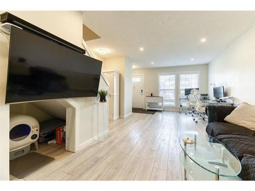 122 Cranbrook Square Se, Calgary, AB - Indoor Photo Showing Living Room