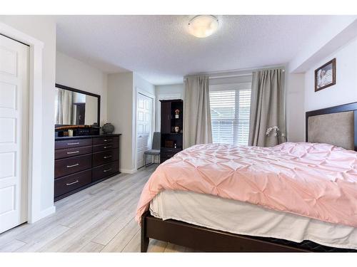 122 Cranbrook Square Se, Calgary, AB - Indoor Photo Showing Bedroom