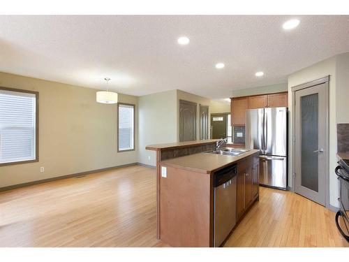 6 Cranberry Place Se, Calgary, AB - Indoor Photo Showing Kitchen With Stainless Steel Kitchen With Double Sink