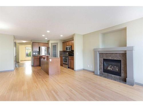 6 Cranberry Place Se, Calgary, AB - Indoor Photo Showing Living Room With Fireplace