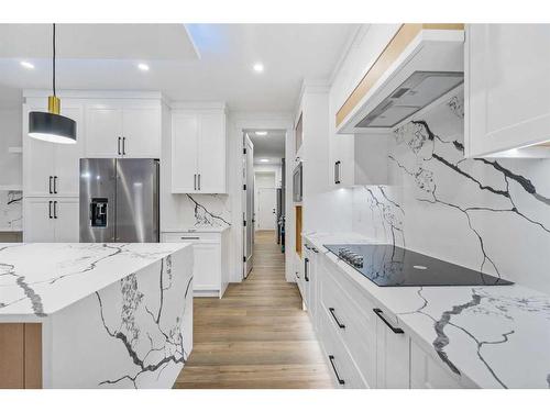 178 Kinniburgh Crescent, Chestermere, AB - Indoor Photo Showing Kitchen With Stainless Steel Kitchen With Upgraded Kitchen