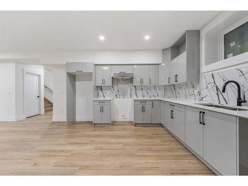 178 Kinniburgh Crescent, Chestermere, AB - Indoor Photo Showing Kitchen With Double Sink