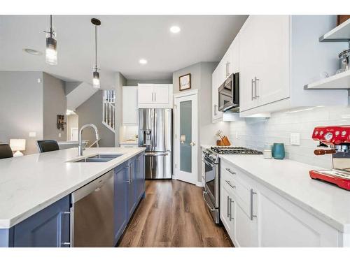 103 Cougarstone Gardens Sw, Calgary, AB - Indoor Photo Showing Kitchen With Stainless Steel Kitchen With Double Sink With Upgraded Kitchen