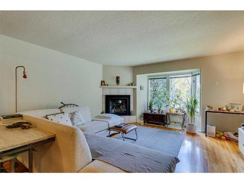 4212 1A Street Sw, Calgary, AB - Indoor Photo Showing Living Room With Fireplace