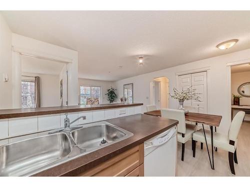 4209-70 Panamount Drive Nw, Calgary, AB - Indoor Photo Showing Kitchen With Double Sink